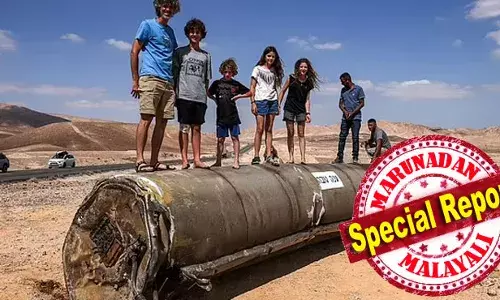 ഇറാന്റെ ന്യൂക്ലിയര്‍ സൈറ്റുകള്‍ ലക്ഷ്യം വച്ച് ഇസ്രായേല്‍ നീങ്ങുമ്പോള്‍ മിസൈല്‍ അവശിഷ്ടങ്ങളെ കളിപ്പാട്ടമാക്കി ഇസ്രായേല്‍ പിള്ളേര്‍; ഇറാന്‍ അയച്ച മിസ്സൈലുകള്‍ക്കിടയില്‍ സെല്‍ഫി മത്സരവുമായി ഇസ്രായേലി യുവാക്കള്‍