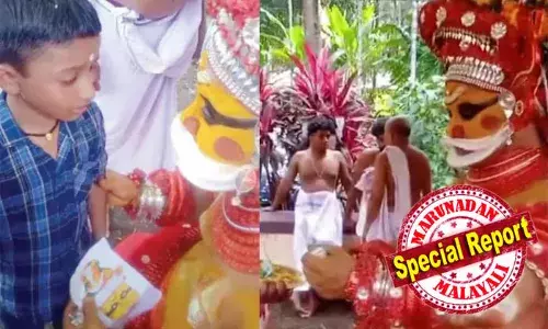 ഇത്രയും മൂല്യമുള്ളതിന് പകരം തരാന്‍ എന്റെ കൈയിലിലൊന്നുമില്ലലോ! കുഞ്ഞുചിത്രകാരനെ നെഞ്ചോട് ചേര്‍ത്ത് മുത്തപ്പന്‍;താന്‍ വരച്ച മുത്തപ്പന്റെ ചിത്രം കാണിക്കയായി സമര്‍പ്പിച്ച് കുരുന്ന്; വൈറലായി വീഡിയോ