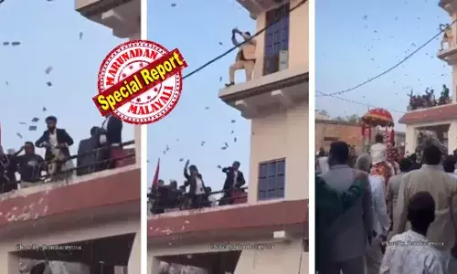 വിവാഹ ആഘോഷത്തിനിടെ അതിഥികളുടെ മുകളിലേക്ക് കാശ് വാരിയെറിഞ്ഞ് വരന്‍റെ കുടുംബം; 20 ലക്ഷം രൂപയുടെ നോട്ടുകളാണ് വലിച്ചെറിഞ്ഞത്; നോട്ടുകൾ വാരാൻ തലങ്ങും വിലങ്ങും ഓട്ടം; വീഡിയോ വൈറൽ; പിന്നാലെ സമൂഹ മാധ്യമങ്ങളിൽ വിമർശനം