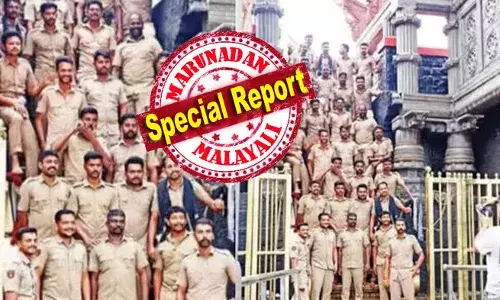 പരിപാവനമായ പതിനെട്ടാം പടിയില്‍ പുറംതിരഞ്ഞ് നിന്ന് ഫോട്ടോ ഷൂട്ട് നടത്തിയത് ആചാര ലംഘനം; പോലീസ് ഉദ്യോസ്ഥര്‍ക്ക് അവസരം നല്‍കിയതില്‍ ഒന്നാം പ്രതി ആഭ്യന്തര വകുപ്പ് കൈകാര്യം ചെയ്യുന്ന മുഖ്യമന്ത്രി; വിവാദം ആളിക്കത്തിച്ച് വി എച്ച് പി; സന്നിധാനത്തെ ആ ഫോട്ടോ ഷൂട്ട് അന്വേഷണത്തില്‍