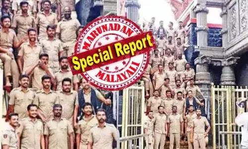 പതിനെട്ടാംപടിയിലെ പൊലീസ് ഫോട്ടോഷൂട്ട്; ഇടപെട്ട് ഹൈക്കോടതി ദേവസ്വം ബെഞ്ചും; പോലീസ് നടപടി അംഗീകരിക്കാനാകില്ലെന്ന് ഹൈക്കോടതി; നാളെ റിപ്പോര്‍ട്ട് സമര്‍പ്പിക്കാന്‍ എക്‌സിക്യൂട്ടീവ് ഓഫീസര്‍ക്ക് നിര്‍ദേശം; സംഭവത്തില്‍ ദുഖവും വിയോജിപ്പും അറിയിക്കുന്നതായി പന്തളം കൊട്ടാരവും