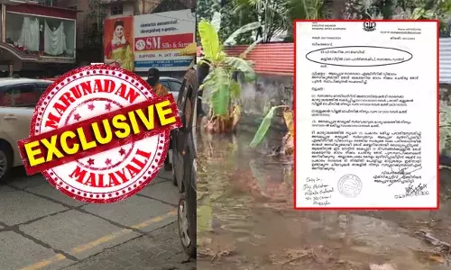 എസ് എം സില്‍ക്‌സും പോപ്പി കുടയും പത്തുവര്‍ഷം മുന്‍പു നടത്തിയ കയ്യേറ്റത്തിന്റെ ഫലമായി മഴക്കാലത്തു പ്രദേശമാകെ വെള്ളക്കെട്ടിലാകുന്നതു പതിവ്; തോട് പൂര്‍വ്വ സ്ഥിതിയിലാക്കാന്‍ നഗര സഭ നോട്ടീസ് നല്‍കിയിട്ടും വമ്പന്മാര്‍ക്ക് കുലുക്കമില്ല; ആലപ്പുഴയിലെ കിടങ്ങാംപറമ്പില്‍ മഴക്കാലം ദുരിതമാകുമ്പോള്‍