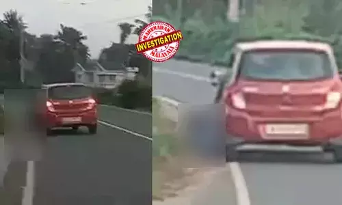 പരസ്പരം കടിച്ചുകീറിയ യുവാക്കളുടെ രണ്ടുസംഘങ്ങളെ തടയാന്‍ ശ്രമിച്ചത് കുറ്റമായി; മാനന്തവാടിയില്‍ ആദിവാസി യുവാവിനെ റോഡിലൂടെ വലിച്ചിഴച്ച് ക്രൂരമര്‍ദ്ദനം; കാര്‍ ഡോറിനോട് കൈചേര്‍ത്ത് പിടിച്ച് അരക്കിലോമീറ്റര്‍ വലിച്ചിഴച്ചു; യുവാവ് ആശുപത്രിയില്‍