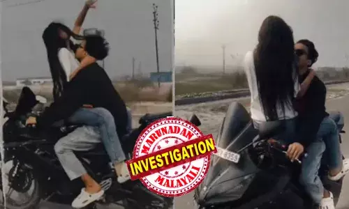 റോഡിൽ മതിമറന്ന് അനുരാഗം..; ഫ്യൂവൽ ടാങ്കിൽ കാമുകിയെ ഇരുത്തി ബൈക്ക് റൈഡ്; ഫുൾ പ്രണയ വൈബ്; സിനിമയെ വെല്ലും സീൻ; എല്ലാം ആസ്വദിച്ച് ബൈക്കോടിച്ച് യുവാവ്; ബോളിവുഡ് സോങ്ങ് ഷൂട്ടാണോ എന്ന് കണ്ടുനിന്നവർ; വീഡിയോ വൈറൽ; ക്യൂട്ട് കപ്പിൾസിനെ തപ്പിയിറങ്ങി പോലീസ്!