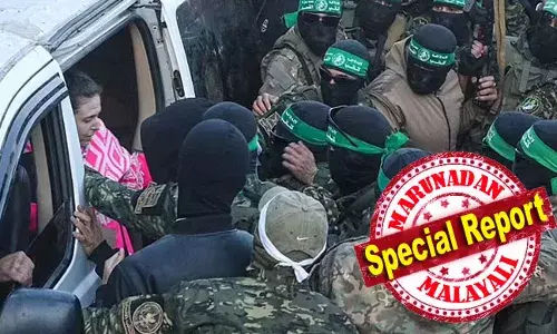 തടവുകാരെ റെഡ് ക്രോസിന് കൈമാറിയത് മുഖം മുഴുവന്‍ മൂടി കെട്ടിയ ഹമാസ് ഭീകരര്‍; ഇസ്രായേല്‍ പിന്മാറിയതോടെ ഗസയില്‍ തോക്കേന്തി ഹമാസിന്റെ കൂറ്റന്‍ പ്രകടനം; ജൂതന്മാരെ എടുക്കാന്‍ മൊഹമ്മദിന്റെ സേന എത്തുന്നു എന്ന ആര്‍പ്പ് വിളി; വെടിനിര്‍ത്തലിന് ശേഷം സംഭവിക്കുന്നത്