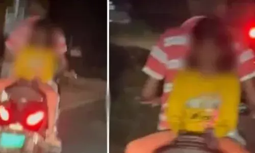 സ്‌കൂട്ടറിന് പിറകില്‍ തിരിഞ്ഞിരുന്ന് പെൺകുട്ടിയുടെ അപകട യാത്ര; ഹെൽമറ്റും ധരിച്ചിട്ടില്ല; ദൃശ്യങ്ങൾ പ്രചരിച്ചതോടെ അച്ഛനെതിരെ കേസ്; സംഭവം കോഴിക്കോട്