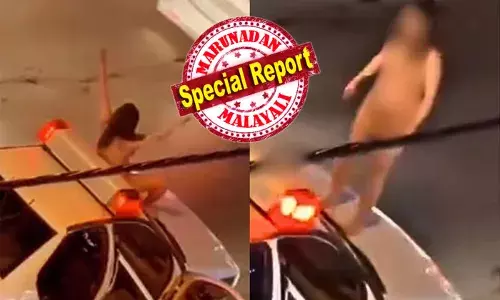 പോലീസ് കാറിന് മുകളില്‍ കയറിനിന്ന് നഗ്‌നയായ യുവതി; തോക്കുധാരിയായ പോലീസുകാരനു നേരെ ആര്‍ത്തുവിളിച്ചു; നഗ്ന യുവതിയെ വിലങ്ങു വെക്കാന്‍ മടിച്ചു ഉദ്യോഗസ്ഥര്‍; ഇറാനിലെ ഡ്രസ് കോഡിനെതിരായ പ്രതിഷേധം സോഷ്യല്‍ മീഡിയയിലും സജീവ ചര്‍ച്ചയില്‍