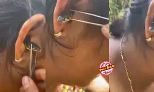 ഉറങ്ങി കിടക്കുമ്പോള്‍ ചെവിക്കുള്ളില്‍ പാമ്പ് കയറുമോ? അതും ഉഗ്രവിഷമുള്ള വെളളിക്കെട്ടന്‍; കൊടുവള്ളിയില്‍ യുവതിയുടെ ചെവിയില്‍ കയറിയ പാമ്പിന്റെ വീഡിയോ സോഷ്യല്‍ മീഡിയയില്‍; വൈറല് വീഡിയോയ്ക്ക് പിന്നില്‍