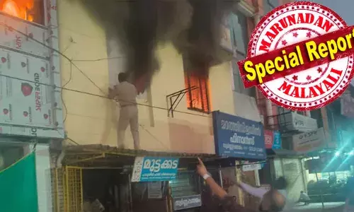 ആളിപ്പടരുന്ന അഗ്‌നിയില്‍ അരക്കൈ നോക്കാനുറപ്പിച്ച് ഏനാത്ത് എസ് എച്ച് ഒ; പെട്രോള്‍ പമ്പിന് സമീപമുള്ള സ്റ്റുഡിയോയില്‍ പടര്‍ന്ന തീ അണയ്ക്കാന്‍ അമൃതസിങ് നായകത്തിന്റെ ഒറ്റയാള്‍ ശ്രമം; കൈയ്ക്ക് പരുക്കേറ്റിട്ടും പിന്മാറാതെ രക്ഷാപ്രവര്‍ത്തനം