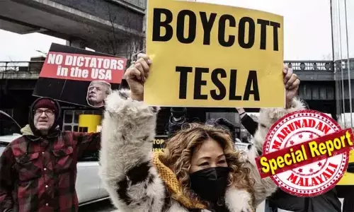 തങ്ങളുടെ തൊഴില്‍ തെറിപ്പിക്കുന്ന മസ്‌ക്കിന്റെ ടെസ്ല വേണ്ട! ബഹിഷ്‌ക്കരണ ആഹ്വാനം സജീവം; മസ്‌ക്കിന്റെ ടെസ്ല കാര്‍ ഷോറൂമുകള്‍ക്ക് പുറത്ത് വന്‍ പ്രതിഷേധം