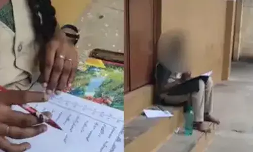 ആര്‍ത്തവം; എട്ടാം ക്ലാസ് വിദ്യാര്‍ത്ഥിനിക്ക് പരീക്ഷാ ഹാളില്‍ വിലക്ക്; കുട്ടി പരീക്ഷ എഴുതിയത് ക്ലാസിനു വെളിയില്‍ തറയിലിരുന്ന്: വീഡിയോ വൈറലായതിന് പിന്നാലെ പ്രിന്‍സിപ്പളിനെ സസ്‌പെന്‍ഡ് ചെയ്ത് വിദ്യാഭ്യാസ വകുപ്പ്