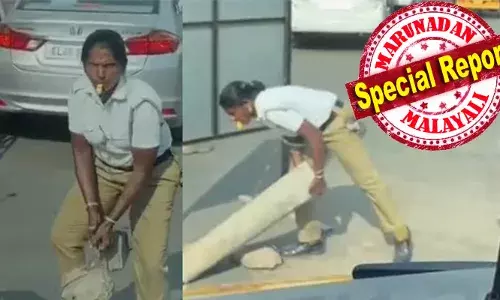 സഹായത്തിന് കാത്തുനിന്നില്ല; ഉത്തരവാദിത്വം തനിയെ ഏറ്റെടുത്തു; ഒറ്റയ്ക്ക് കോണ്‍ക്രീറ്റ് തൂണുകള്‍ എടുത്തുമാറ്റി; ഗതാഗതക്കുരുക്കില്‍ ആംബുലന്‍സിന് വഴിയൊരുക്കി; കൈയ്യടി നേടി വനിതാ ട്രാഫിക്