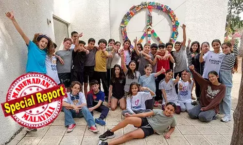 ഇവിടെ ഫലസ്തീനികളും ജൂതന്മാരും ഒരേ കുടക്കീഴില്‍ ജീവിക്കുന്നു; ആര്‍ക്കും ആരെയും പേടിയുമില്ല പരാതിയുമില്ല; സഹിക്കാനാവാത്തത് രണ്ടു കൂട്ടരിലേയും തീവ്രവാദികള്‍ക്ക്; ഇസ്രയേലിനും ഫലസ്തീനും ഒരുമിച്ചു ജീവിക്കാമെന്ന് തെളിയിച്ച ഗ്രാമത്തിന്റെ കഥ