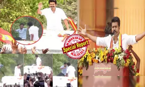 അണ്ണൻ...ദർശനത്തിനായി റോഡ് വശങ്ങളിൽ ഓടിക്കൂടിയ ജനങ്ങൾ; പാർട്ടി പതാക വീശിയും ഷാൾ അണിഞ്ഞും ചങ്കൂറ്റം; എൻ നെഞ്ചിൽ കൂടിയിരിക്കും.. സ്ഥിരം നമ്പർ ഇറക്കി ദളപതി വിജയ്; ആളുകൾ ആർപ്പുവിളിച്ച് വരവേൽക്കുന്നതിനിടെ ട്വിസ്റ്റ്; പ്ലീസ്..താഴെ ഇറങ്ങുവെന്ന് മറുപടി; ഇത് വെറും വിഡ്ഢിത്തമെന്ന് കമെന്റുകൾ!