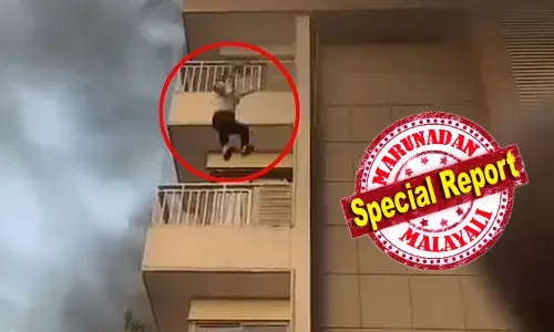 തീപിടിച്ച അപ്പാര്‍ട്ട്‌മെന്റിന്റെ അഞ്ചാം നിലയില്‍ നിന്ന് ചാടിയ സ്ത്രീ അത്ഭുതകരമായി രക്ഷപെട്ടു; മെത്തകള്‍ വിരിച്ചു പിടിച്ചു രക്ഷയൊരുക്കി ആള്‍ക്കൂട്ടം; ആ അതിജീവനത്തിന്റെ വീഡിയോ സൈബറിടങ്ങളില്‍ വൈറല്‍