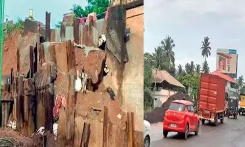 ശക്തമായ മഴ; കൊല്ലം ചവറ പാലത്തിന്റെ കോണ്‍ക്രീറ്റ് ഭിത്തി അടര്‍ന്ന് വീണു