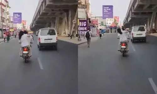 എന്തൊരു വിധിയിത്...; ഓടുന്ന ബൈക്കിൽ ഭാര്യയുടെ അടി കൊള്ളുന്ന ഭർത്താവ്; തല കൊണ്ട് പല മുവുകൾ കാണിച്ചിട്ടും രക്ഷയില്ല; ചിരിയടക്കാൻ പറ്റാതെ കണ്ടുനിന്നവർ; വൈറലായി വീഡിയോ!