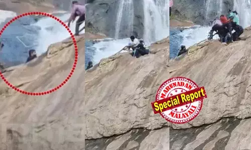 തൂവല്‍ വെള്ളച്ചാട്ടത്തില്‍ സെല്‍ഫി എടുക്കുന്നതിനിടെ കാല്‍വഴുതി വെള്ളച്ചാട്ടത്തില്‍ വീണു; ഒഴുക്കില്‍പ്പെട്ട യുവാവ് പാറയില്‍ തങ്ങിനിന്നതോടെ നാട്ടുകാരുടെ രക്ഷാപ്രവര്‍ത്തനം; മധുര സ്വദേശിയെ കയറിട്ട് കുരുക്കി മുകളിലേക്ക് വലിച്ച് രക്ഷപ്പെടുത്തിയത് സാഹസികമായി