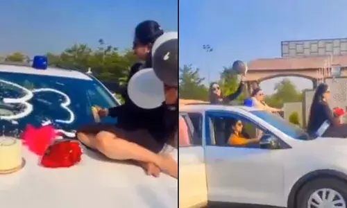 പൊലീസ് വാഹനത്തിന്റെ ബോണറ്റിലിരുന്ന് ഡിഎസ്പിയുടെ ഭാര്യയുടെ പിറന്നാള്‍ ആഘോഷം; വിന്‍ഡ്ഷീല്‍ഡില്‍ 33 എന്ന് എഴുതി കേക്ക് മുറിക്കുന്നതിന്റെ ദൃശ്യങ്ങള്‍