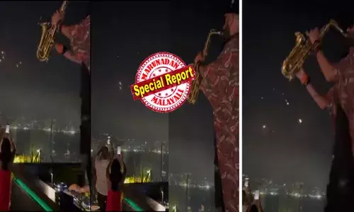 35,000 അടി ഉയരത്തിൽ ഇസ്രയേലിന് നേരെ കുതിക്കുന്ന ഇറാൻ മിസൈലുകൾ; ഇതെല്ലാം കണ്ട് കൂളായി സാക്സഫോണ്‍ വായിച്ച് നില്‍ക്കുന്ന യുവാവ്; ഇരുണ്ട കാഴ്ചകൾ ഫോണിൽ പകർത്തി കണ്ടുനിന്നവർ; ലെബണനിലെ ഹോട്ടൽ റൂഫ് ടോപ്പ് ദൃശ്യങ്ങൾ വൈറൽ; വ്യാപക വിമർശനം!