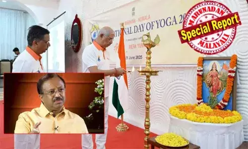 യോഗാ ദിനത്തിലും ആര്‍എസ്എസ് ഭാരതാംബ; പരിപാടികള്‍ തുടങ്ങിയത് വിവാദ ചിത്രത്തിന് മുന്നില്‍ വിളക്ക് കൊളുത്തിയും പുഷ്പാര്‍ച്ചന നടത്തിയും; നിലപാട് മാറ്റാതെ ഗവര്‍ണര്‍; ഗവര്‍ണറുടെ ചങ്കില്‍ ഇന്ത്യയാണ്; അതാണ് ഭാരതാംബയുടെ ചിത്രത്തില്‍ പുഷ്പാര്‍ച്ചന നടത്തിയത്. ചൈന ചങ്കിലുള്ളവര്‍ക്ക് അതില്‍ താല്‍പര്യമുണ്ടാവില്ലെന്ന് വി. മുരളീധരന്‍