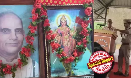 മന്നത്ത് പത്മനാഭന്റെ ചിത്രത്തിനൊപ്പം കാവിക്കൊടിയേന്തിയ ഭാരതാംബയുടെ ചിത്രം വെക്കാന്‍ ശ്രമം; എതിര്‍പ്പുമായി ഒരു വിഭാഗം; മാളയിലെ യോഗാദിന പരിപാടിയില്‍ നിന്ന് ആര്‍എസ്എസ് നേതാവിനെ ഇറക്കിവിട്ടു; പരിപാടിക്ക് അനുമതി നിഷേധിച്ച് പൊലീസ്