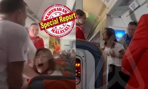 തനിക്ക് കടുത്ത നെഞ്ച് വേദന അനുഭവപ്പെടുന്നു; നെഞ്ചില്‍ കൈയമര്‍ത്തി കൊണ്ട് യാത്രക്കാരി എയര്‍ ഹോസ്റ്റസിനോട് അലറി വിളിച്ചു; ബിസിനസ് ക്ലാസിലേക്ക് മാറ്റണമെന്ന് ആവശ്യപ്പെട്ട് ബഹളം വെക്കല്‍; പിടിവലിക്കിടെ താഴെ വീണ യാത്രക്കാരിയെ സീറ്റില്‍ കെട്ടിയിട്ടു