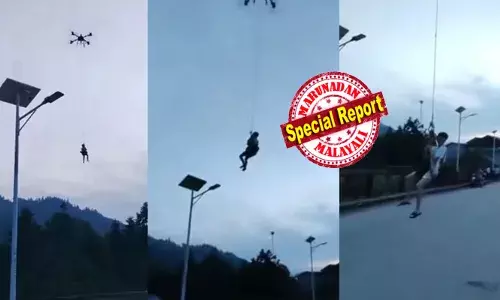 വീടിനുള്ളിൽ ഇരിക്കുമ്പോൾ ഇരമ്പൽ ശബ്ദം; നടയിലിറങ്ങിയതും ഒരാൾ പൊക്കത്തിൽ വെള്ളം; പേടിച്ച് മുകളിലത്തെ നിലയിൽ അഭയം പ്രാപിച്ച് യുവാവ്; ഒടുവിൽ ഹെൽപ് മീ..യെന്ന ഒരൊറ്റ ഫോൺ കോളിൽ ആകാശത്ത് രക്ഷകൻ; ചൈനയിൽ നടന്നത്!