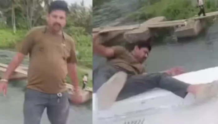 പാലത്തിന് മുകളിലിരുന്ന് ഫോട്ടോയെടുക്കാൻ ശ്രമിക്കുന്നതിനിടെ അപകടം; ബാലൻസ് തെറ്റി നദിയിലേക്ക് വീണ് കാണാതായി; യുവാവിനായി തിരച്ചിൽ തുടരുന്നു; പേടിപ്പിച്ച് ദൃശ്യങ്ങൾ പാലത്തിന് മുകളിലിരുന്ന് ഫോട്ടോയെടുക്കാൻ ശ്രമിക്കുന്നതിനിടെ അപകടം; ബാലൻസ് തെറ്റി നദിയിലേക്ക് വീണ് കാണാതായി; യുവാവിനായി തിരച്ചിൽ തുടരുന്നു; പേടിപ്പിച്ച് ദൃശ്യങ്ങൾ