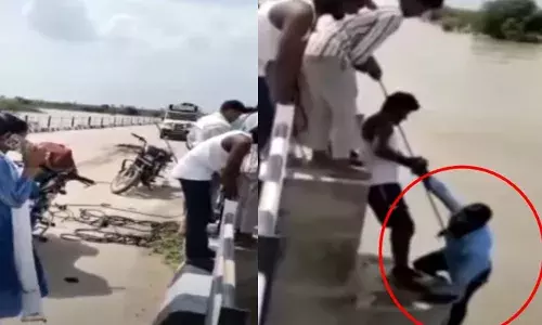 സെല്‍ഫി എടുക്കുന്നതിനിടെ ഭാര്യ പാലത്തില്‍ നിന്നും തളളി താഴെയിട്ടു; അബദ്ധത്തില്‍ കാല്‍വഴുതി വീണെന്ന് യുവതി; ഭര്‍ത്താവിനെ നാട്ടുകാര്‍ രക്ഷപ്പെടുത്തി