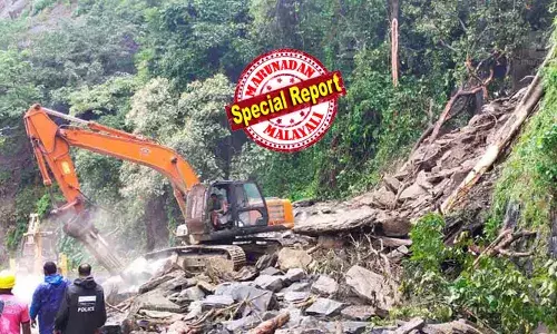 താമരശ്ശേരി ചുരത്തില്‍ വീണ്ടും മണ്ണിടിച്ചില്‍;  മണ്ണും കല്ലും നീക്കുന്നതിനിടെ അപകടം;  കനത്ത മഴയും കോടമഞ്ഞും പ്രതിസന്ധി;  ഡ്രോണ്‍ ഉപയോഗിച്ച് പരിശോധന; ഗതാഗതം നിരോധിച്ച് 21 മണിക്കൂര്‍;  മണ്ണു മാറ്റുന്നതിന് വേഗതയില്ലെന്ന് വിമര്‍ശനം
