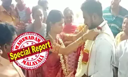 എട്ടു വര്‍ഷത്തെ പ്രണയത്തിനൊടുവില്‍ വിവാഹം; കതിര്‍മണ്ഡപത്തിലെത്തും മുന്‍പേ വരനെ തടങ്കലിലാക്കി ബന്ധുക്കള്‍: ഒടുവില്‍ ജാതിമതില്‍ തകര്‍ത്ത് സിപിഎം ഓഫിസില്‍ വിവാഹിതരായി അമൃതയും സഞ്ജയും