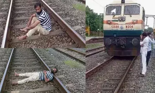 മദ്യലഹരിയില്‍ റെയില്‍വേ ട്രാക്കില്‍ കിടന്ന് യുവാവ്; പിടിച്ചു മാറ്റാന്‍ ശ്രമിച്ചവരെ അസഭ്യം പറഞ്ഞും കല്ലെടുത്തെറിഞ്ഞും പരാക്രമം: ഒടുവില്‍ പോലിസെത്തി കസ്റ്റഡിയിലെടുത്ത് ആര്‍പിഎഫിനു കൈമാറി: വൈകിയത് മൂന്ന് ട്രെയിനുകള്‍