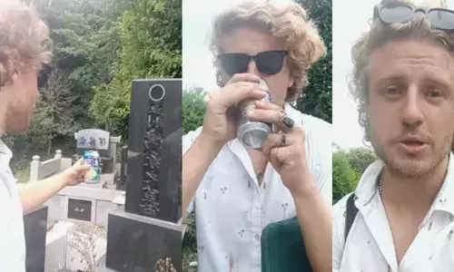 മരിച്ചാലും വിടില്ല...; ഒരു ഭാവഭേദവുമില്ലാതെ സെമിത്തേരിയിലേക്ക് കയറിച്ചെന്ന യുവാവ്; കല്ലറയ്ക്ക് മുകളിൽ വച്ച പാനീയം എടുത്തുകുടിച്ച് വൈറലായി; പിന്നാലെ വിവാദം