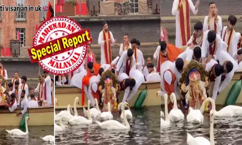 ശാന്തമായ തടാകത്തിലൂടെ നീന്തി തുടിക്കുന്ന അരയന്നങ്ങൾ; സമീപത്ത് ഒരു ബോട്ടിൽ കൈകൾ കൊട്ടി മന്ത്രങ്ങൾ ജപിച്ച് കുറെ ഇന്ത്യക്കാർ; ഗണേശവി​ഗ്രഹം നിമജ്ജനം ചെയ്ത് ആചാരം; ഇത്..തങ്ങൾക്കുള്ള ആഹാരമാണെന്ന് കരുതി ഓടിയെത്തി മിണ്ടാപ്രാണികളും; ഇവന്മാരെ  ഡീപോർട്ട് ചെയ്യ് എന്ന് കമെന്റുകൾ; വൈറലായി യുകെയിലെ ദൃശ്യങ്ങൾ