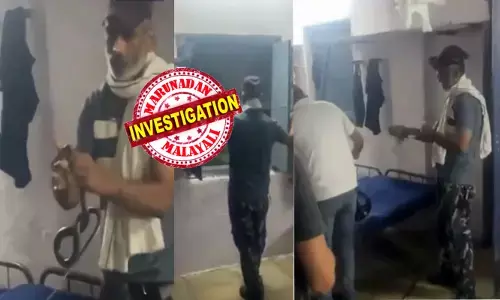 നീല ടിഷർട്ട് ധരിച്ച് തലയിൽ ക്യാപ്പ് വച്ച് ഒട്ടും പതറാതെ ഓടിയെത്തി; അതെ സ്പീഡിൽ ജനാല തുറന്നതും ചാടിയെത്തിയ കൂറ്റൻ പാമ്പ്; പിടിച്ചതും കൈയ്യിൽ ആഞ്ഞ് കടി; മുഖത്ത് തെല്ലൊരു ഭാവവ്യത്യാസമില്ലാതെ അതിഥിയെ ബാഗിലിട്ട് കൂളായി മടക്കം; മണിക്കൂറുകൾ കഴിഞ്ഞതും നെഞ്ചുലച്ച് ആ വാർത്ത