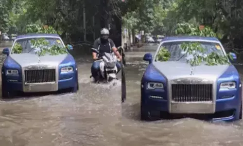 വെള്ളക്കെട്ടിലൂടെ ഒരു കാറിന്റെ രാജകീയ വരവ്; ഒന്ന് സൂക്ഷിച്ച് നോക്കിയതും അമ്പരപ്പ്; റോൾസ് റോയ്‌സ് ന്റെ എൻട്രിയിൽ നെറ്റിസൺസ് പറഞ്ഞത്; ദൃശ്യങ്ങൾ വൈറൽ