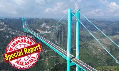 ഈഫല്‍ ടവറിനേക്കാല്‍ രണ്ടിരട്ടി ഉയരം; രണ്ട് മണിക്കൂര്‍ ആയിരുന്ന യാത്ര സമയം പാലം തുറന്നോടെ രണ്ട് മിനിറ്റായി കുറഞ്ഞു; വിദഗ്ധരായ എന്‍ജിനീയര്‍മാരുടെ സംഘം നേതൃത്വം കൊടുത്ത അത്ഭുതം; ചൈനയില്‍ നിന്നും മറ്റൊരു ലോകാത്ഭുതമായി ഹുവാജിയാങ് ഗ്രാന്റ് കാന്യന്‍ പാലം