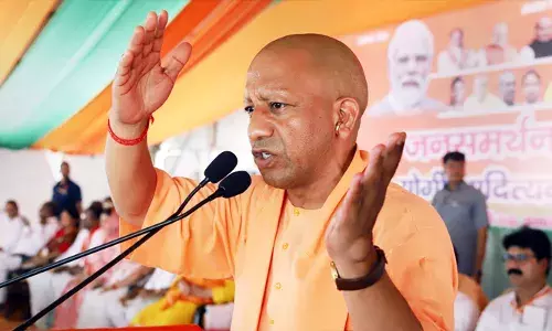 വ്യാജ വോട്ടർമാരെ വോട്ട് ചെയ്യാൻ അനുവദിക്കണോ?, കോൺഗ്രസും ആർ.ജെ.ഡിയും ആഗ്രഹിക്കുന്നത് അതാണ്; ഇലക്ട്രോണിക് വോട്ടിംഗ് മെഷീനുകളെയും അവർ എതിർക്കുന്നു; ബുർഖ വോട്ടർ വിവാദത്തിൽ യോഗി ആദിത്യനാഥ്