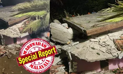 അടിമാലിക്ക് സമീപം കൂമ്പന്‍ പാറയിലെ ദേശീയ പാതയില്‍ മണ്ണിടിച്ചിലില്‍ അപകടത്തില്‍ പെട്ടത് ദുരിതാശ്വാസ ക്യാമ്പില്‍ നിന്നും സാധനങ്ങളെടുക്കാന്‍ വീട്ടിലെത്തിയവര്‍; കുടുങ്ങിയത് ബിജുവും ഭാര്യ സന്ധ്യയും; ഇരുവരുമായി സംസാരിക്കാന്‍ സാധിച്ചെന്ന് നാട്ടുകാര്‍;  ഫയര്‍ഫോഴ്‌സും പോലീസും നാട്ടുകാരും ചേര്‍ന്ന് രക്ഷാപ്രവര്‍ത്തനം തുടരുന്നു