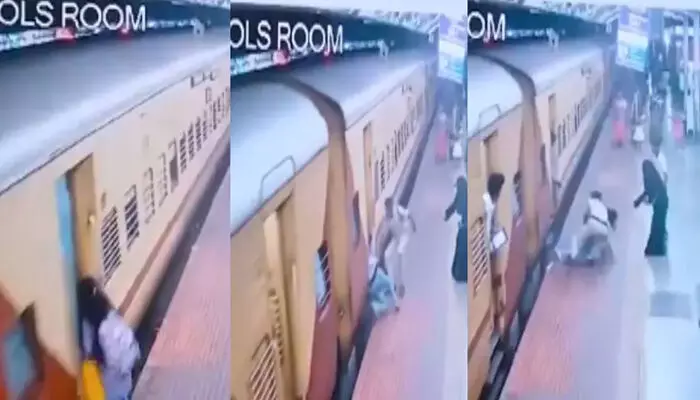 ഓടുന്ന ട്രെയിനില് കയറാന്ശ്രമം; യുവതി കാല്ത്തെന്നി വീണു; സാഹസികമായി ജീവന് രക്ഷിച്ച ആര്പിഎഫ് ഉദ്യോഗസ്ഥന് സല്യൂട്ട് ഓടുന്ന ട്രെയിനില് കയറാന്ശ്രമം; യുവതി കാല്ത്തെന്നി വീണു; സാഹസികമായി ജീവന് രക്ഷിച്ച ആര്പിഎഫ് ഉദ്യോഗസ്ഥന് സല്യൂട്ട്