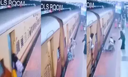 ഓടുന്ന ട്രെയിനില്‍ കയറാന്‍ശ്രമം; യുവതി കാല്‍ത്തെന്നി വീണു; സാഹസികമായി ജീവന്‍ രക്ഷിച്ച ആര്‍പിഎഫ് ഉദ്യോഗസ്ഥന് സല്യൂട്ട്