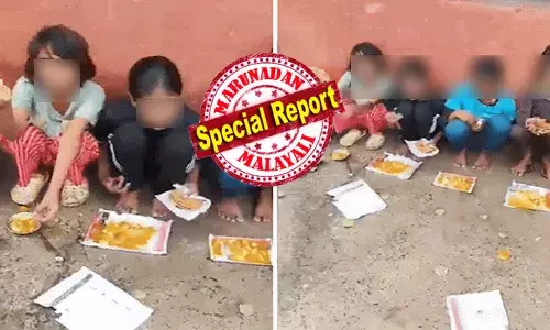 ചുമരിൽ ചാരി നിരനിരയായി ഇരിക്കുന്ന കുഞ്ഞുങ്ങൾ; അവർക്ക് മുന്നിൽ തീർത്തും വിചിത്രമായ രീതിയിൽ ഭക്ഷണം വിളമ്പൽ; പിള്ളേരെ മൈൻഡ് ചെയ്യാതെ അധ്യാപകരും; സോഷ്യൽ മീഡിയയിൽ ചൂടൻ ചർച്ച ചുമരിൽ ചാരി നിരനിരയായി ഇരിക്കുന്ന കുഞ്ഞുങ്ങൾ; അവർക്ക് മുന്നിൽ തീർത്തും വിചിത്രമായ രീതിയിൽ ഭക്ഷണം വിളമ്പൽ; പിള്ളേരെ മൈൻഡ് ചെയ്യാതെ അധ്യാപകരും; സോഷ്യൽ മീഡിയയിൽ ചൂടൻ ചർച്ച