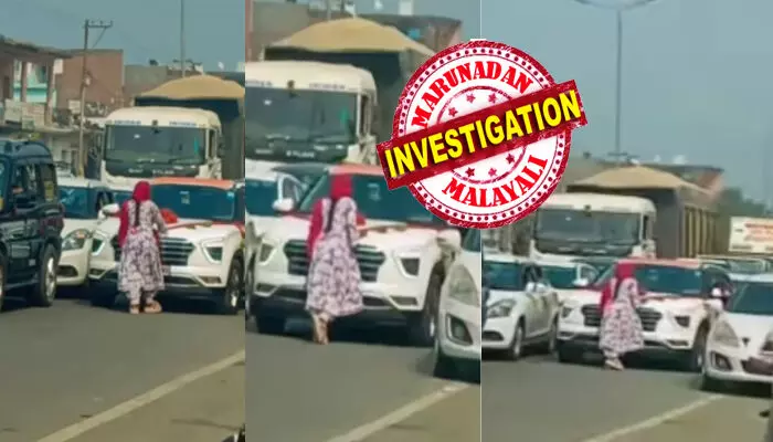 തിരക്കേറിയ റോഡിലെ ബ്ലോക്കിൽപ്പെട്ട് കുടുങ്ങിയ കാർ; അതുവഴി ചുവന്ന ദുപ്പട്ട ധരിച്ചെത്തിയ യുവതിയുടെ സാഹസിക പ്രകടനം; വണ്ടിയെ ഒരിഞ്ച് അനങ്ങാൻ സമ്മതിക്കാതെ തടയൽ; ചുറ്റും സിനിമയെ വെല്ലും കാഴ്ചകൾ; ഒടുവിൽ സത്യാവസ്ഥ അറിഞ്ഞപ്പോൾ സംഭവിച്ചത്