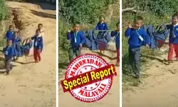 ഭാരം കുറയ്ക്കാൻ ബാഗുകൾ മുളവടിയിൽ തൂക്കി തോളിലേറ്റി; കൈവീശി കാണിച്ചും ചിരിച്ചും ആസ്വദിച്ച് സ്‌കൂളിലേക്ക്; വൈറലായി ആ അഞ്ച് കുരുന്നുകളുടെ വീഡിയോ; ഇതാണ് യഥാർത്ഥ ടീം വർക്ക്; പ്രശംസ കൊണ്ട് മൂടി നെറ്റിസൺസ്