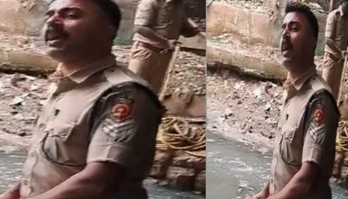 പാലത്തിന് സമീപത്ത് കൂടി നടക്കുന്നതിനിടെ കാൽ വഴുതി അറിയാതെ വീണത് ആമയിഴഞ്ചാൻ തോട്ടിലേക്ക്; വയോധികന് രക്ഷകരായി ഫയർഫോഴ്സ്