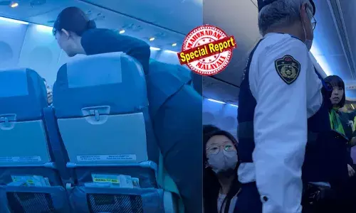 കാമുകിക്കൊപ്പം ഇരിക്കാന്‍ സീറ്റ് തര്‍ക്കം; ഒരു കാരണവശാലും മാറി കൊടുക്കില്ലെന്ന് മറ്റേ യാത്രക്കാരന്‍; രണ്ടുമണിക്കൂറോളം തര്‍ക്കം; അനുസരിക്കാത്ത യാത്രക്കാരനെ പോലീസ് പൊക്കി; ഷാങ്ഹായില്‍ ഇറങ്ങേണ്ട വിമാനം നാല് മണിക്കൂര്‍ പറന്ന് തിരിച്ചെത്തി; മടക്കം 30 മിനിറ്റ് ദൂരം ബാക്കിയുള്ളപ്പോള്‍