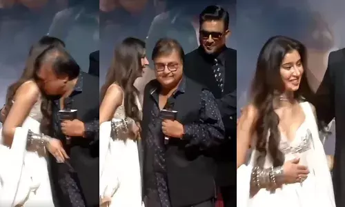 തന്റെ പേര് വിളിച്ചതും നിറഞ്ഞ പുഞ്ചിരിയോടെ വേദിയിലേക്ക് ഓടിയെത്തിയ നടി; പെട്ടെന്ന് തൊട്ട് അടുത്ത് നിന്ന നടന്റെ അതിരുവിട്ട പ്രവർത്തി; കെട്ടിപ്പിടിച്ച് തോളിൽ ചുംബിച്ചതോടെ വിവാദം