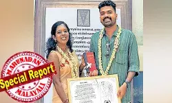 കൊട്ടും കുരവയും താലിമാലയുമില്ല; ഭരണ ഘടന കൈമാറി പ്രതിജ്ഞ ചെയ്ത് വിവാഹിതരായി ശീതളും ജിതിനും: നെന്മാറ സബ് രജിസ്റ്റര് ഓഫിസ് സാക്ഷിയായത് അധ്യാപികയുടേയും വില്ലേജ് ഉദ്യോഗസ്ഥന്റെയും വ്യത്യസ്തമായ വിവാഹത്തിന് കൊട്ടും കുരവയും താലിമാലയുമില്ല; ഭരണ ഘടന കൈമാറി പ്രതിജ്ഞ ചെയ്ത് വിവാഹിതരായി ശീതളും ജിതിനും: നെന്മാറ സബ് രജിസ്റ്റര് ഓഫിസ് സാക്ഷിയായത് അധ്യാപികയുടേയും വില്ലേജ് ഉദ്യോഗസ്ഥന്റെയും വ്യത്യസ്തമായ വിവാഹത്തിന്