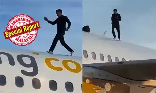 വിമാനത്തിന് മുകളില്‍ വലിഞ്ഞു കയറി യുവാവിന്റെ അഭ്യാസ പ്രകടനം; വലന്‍സിയ വിമാനത്താവളത്തില്‍ നാടകീയ രംഗങ്ങള്‍; ഉദ്യോഗസ്ഥര്‍ പറഞ്ഞിട്ടും ഇങ്ങാന്‍ കൂട്ടാക്കാതെ നൃത്തം ചെയ്യല്‍; ആംസ്റ്റര്‍ഡാമിലേക്ക് പോകേണ്ടിയിരുന്ന വിമാനം വൈകിയത് രണ്ടര മണിക്കൂര്‍